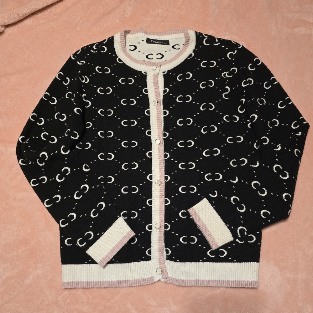 Black and White Cozy Cardigan with Pink Accents